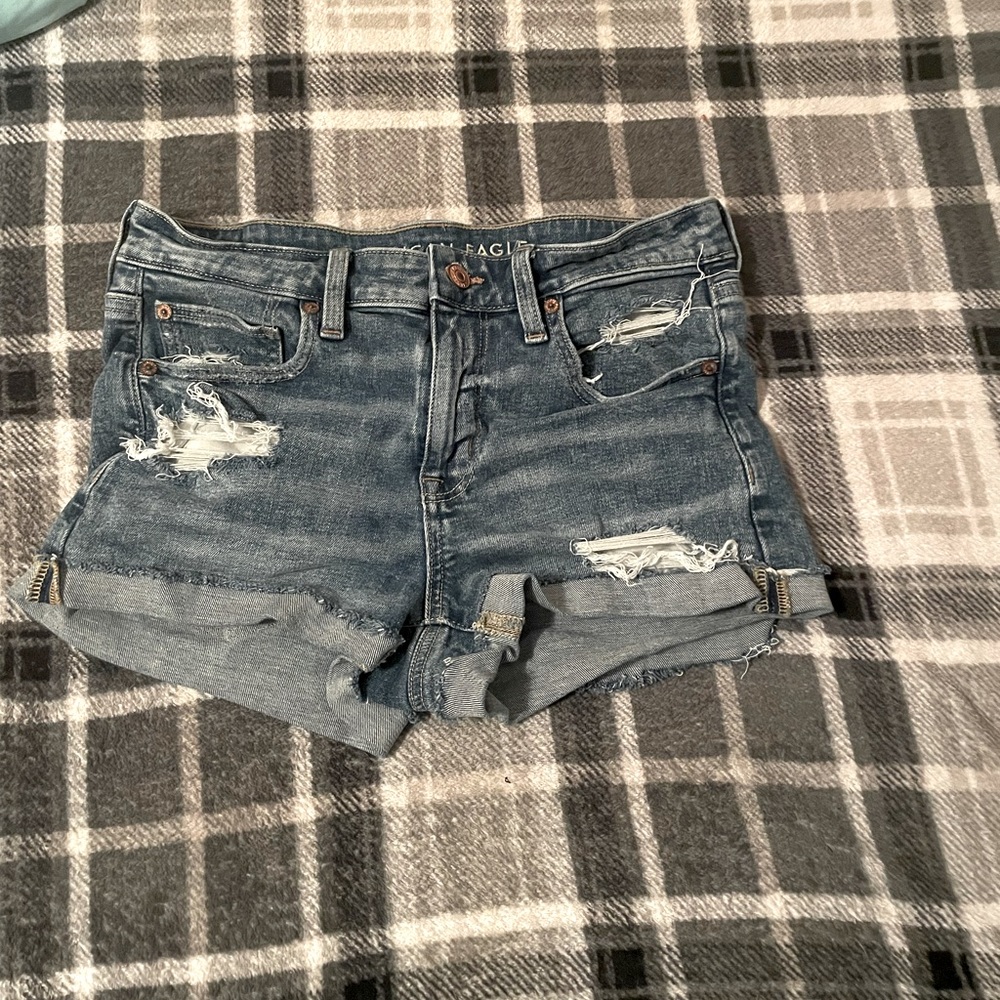 distressed blue jean shorts